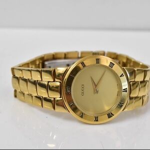 Gucci Gold Bracelet Watch with Roman Dial